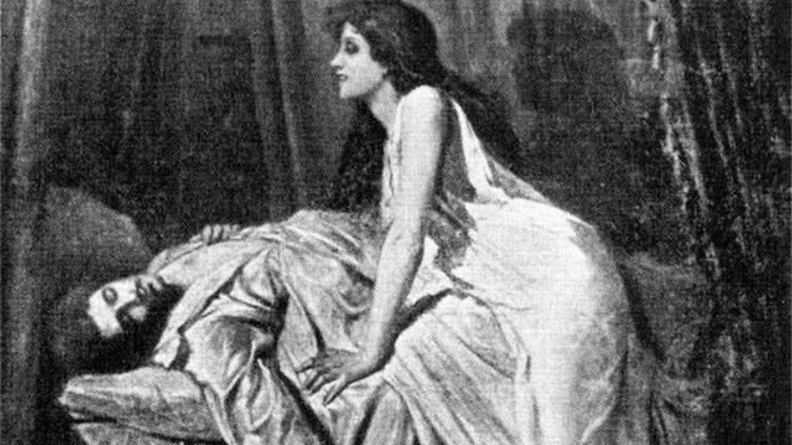 A black and white drawing from the 19th century. The drawing is called “The Vampire” and shows a man lying down on a surface with a woman standing above him. She is looking down on him with her hands on his body.