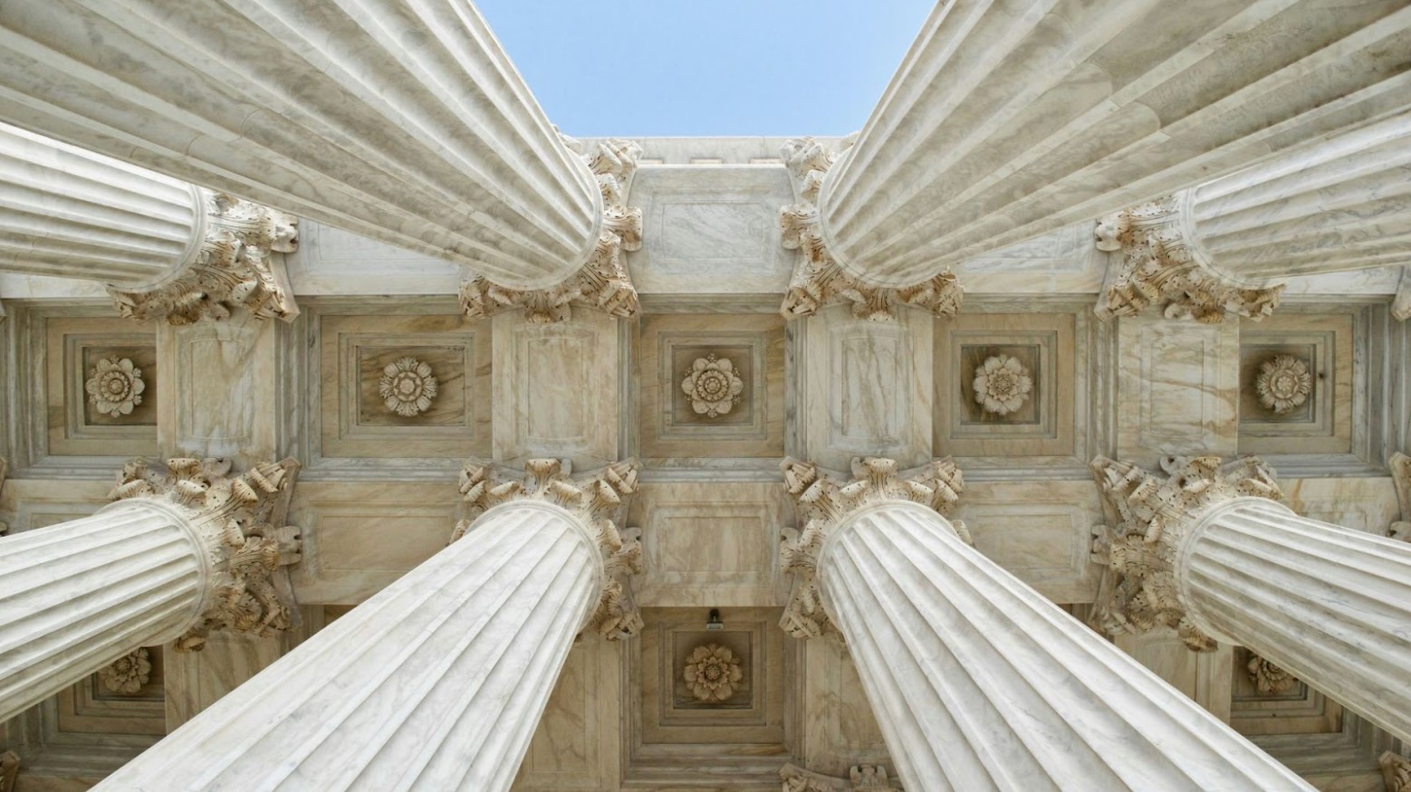 A close-up look at the columns of the Supreme Court building.