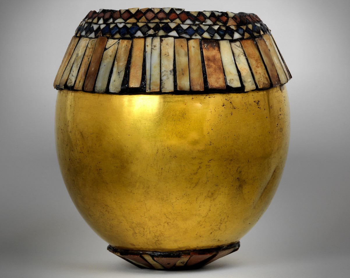 A small golden vessel which resembles an ostrich egg