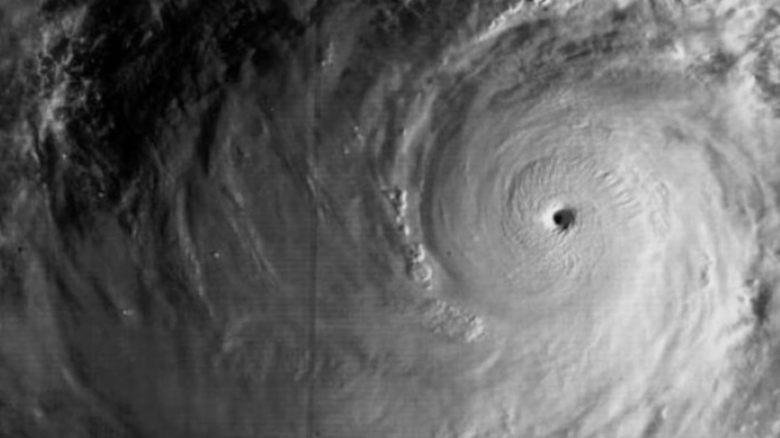 Typhoon Tip at its most intense. The cloud is quite thick and there is a hole in the cloud.