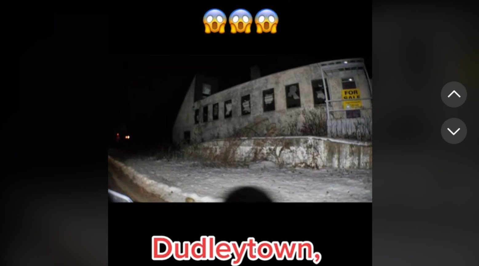This is a screenshot from a TikTok video about Dudleytown, Connecticut. The video shows an abandoned building with a yellow “for sale” sign on the outside. Above the image are three shocked emoji faces, and underneath, it says “Dudleytown” in red and white writing.